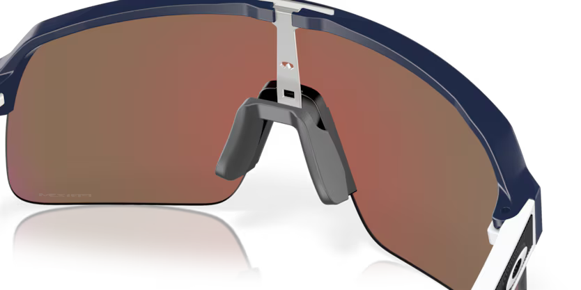 Oakley Sutro Lite Matte Navy Prizm Violet sunglasses, three-quarter interior view showing the frame and nose pads.