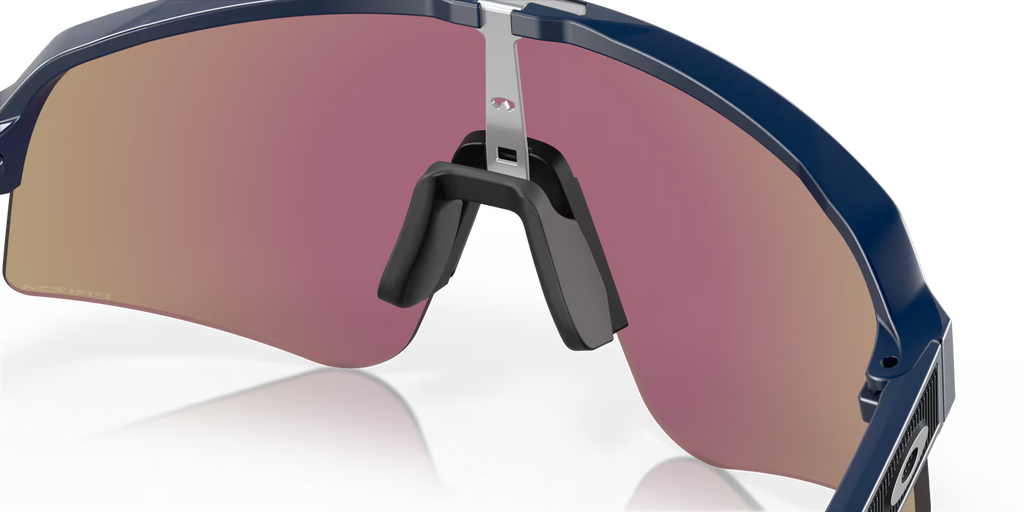 Oakley Sutro Lite Sweep Matte Navy Prizm Sapphire sunglasses, three-quarter interior view showing the navy frame and nose pads.