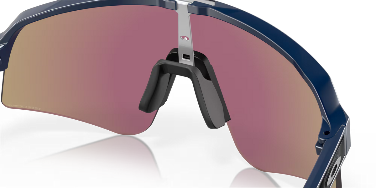 Oakley Sutro Lite Sweep Matte Navy Prizm Sapphire sunglasses, three-quarter interior view showing the navy frame and nose pads.