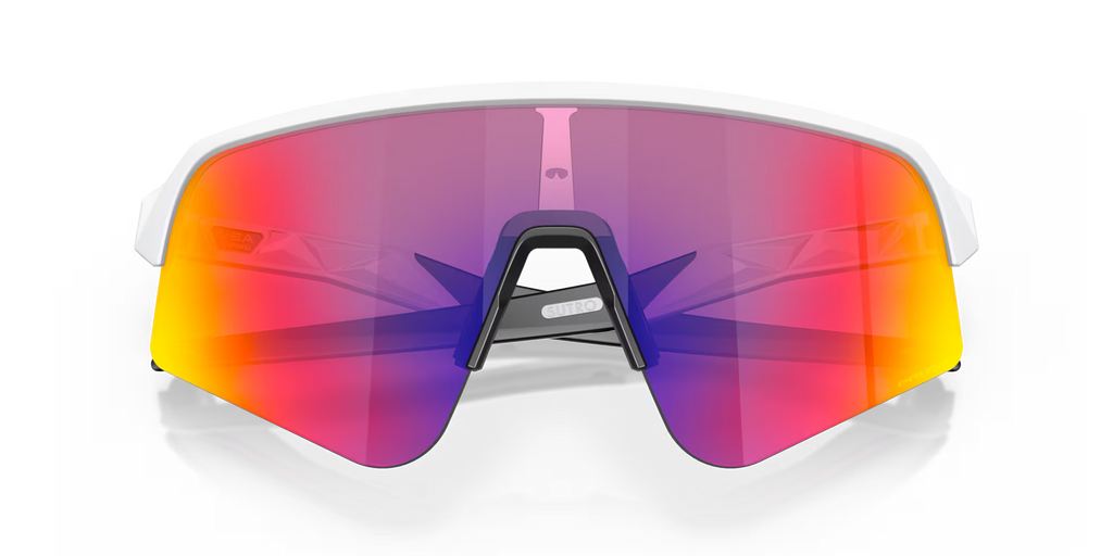 Oakley Sutro Lite Sweep Matte White Prizm Road sports sunglasses, front view with crossed white temples visible through the lens