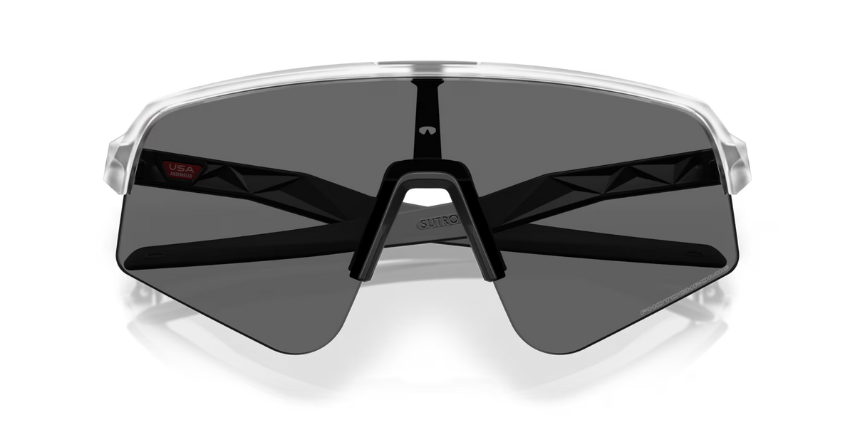 Oakley Sutro Lite Sweep Matte Clear Photochromic sports sunglasses, front view with with the darkest tint of the photochromic lens.